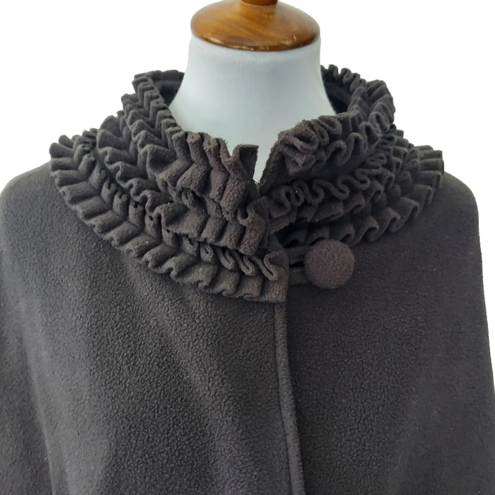 Le Moda Black Fleece Cape with High Ruffled Neck and Ruffled Pockets